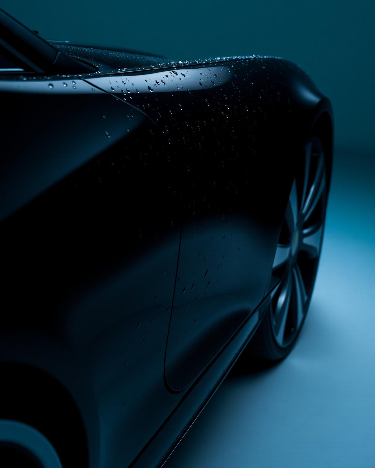 Glossy detailed car with water beads